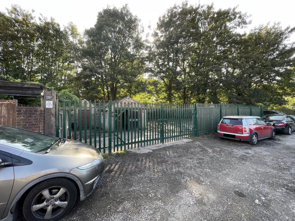 Lot: 53 - GATED STORAGE AND WORKSHOP YARD WITH POTENTIAL - View in front of gates
